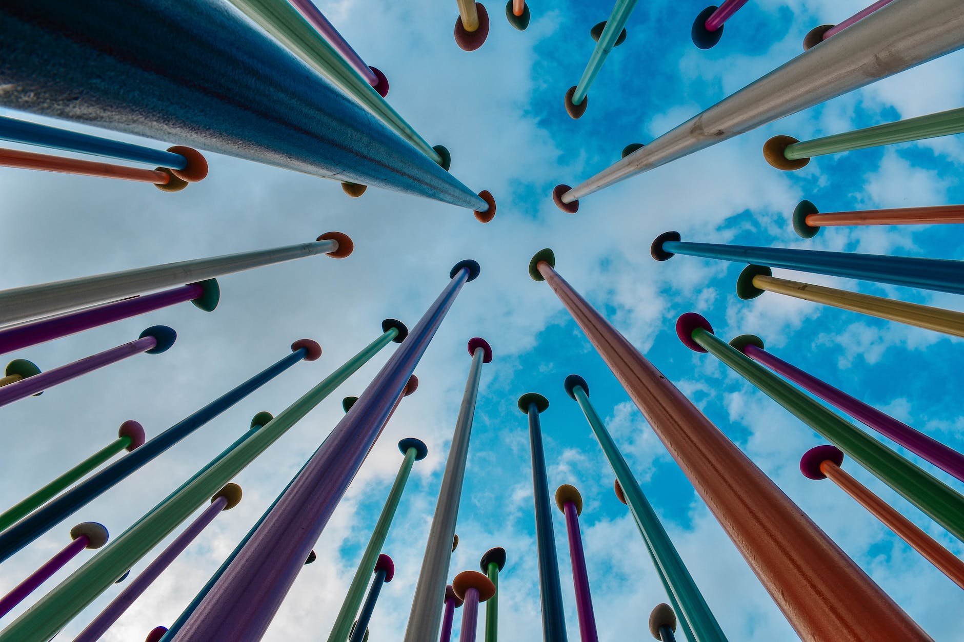 low angle shot of colorful poles